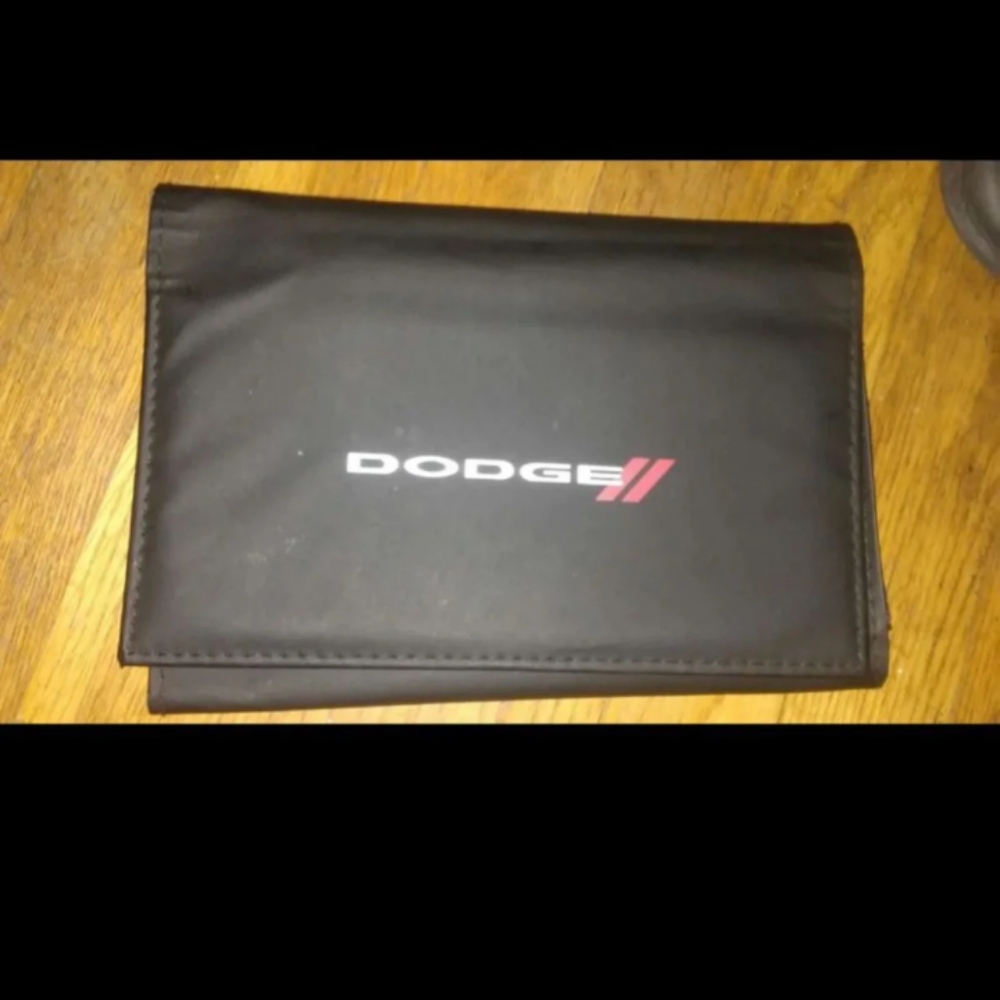 Dodge glove compartment manual holder